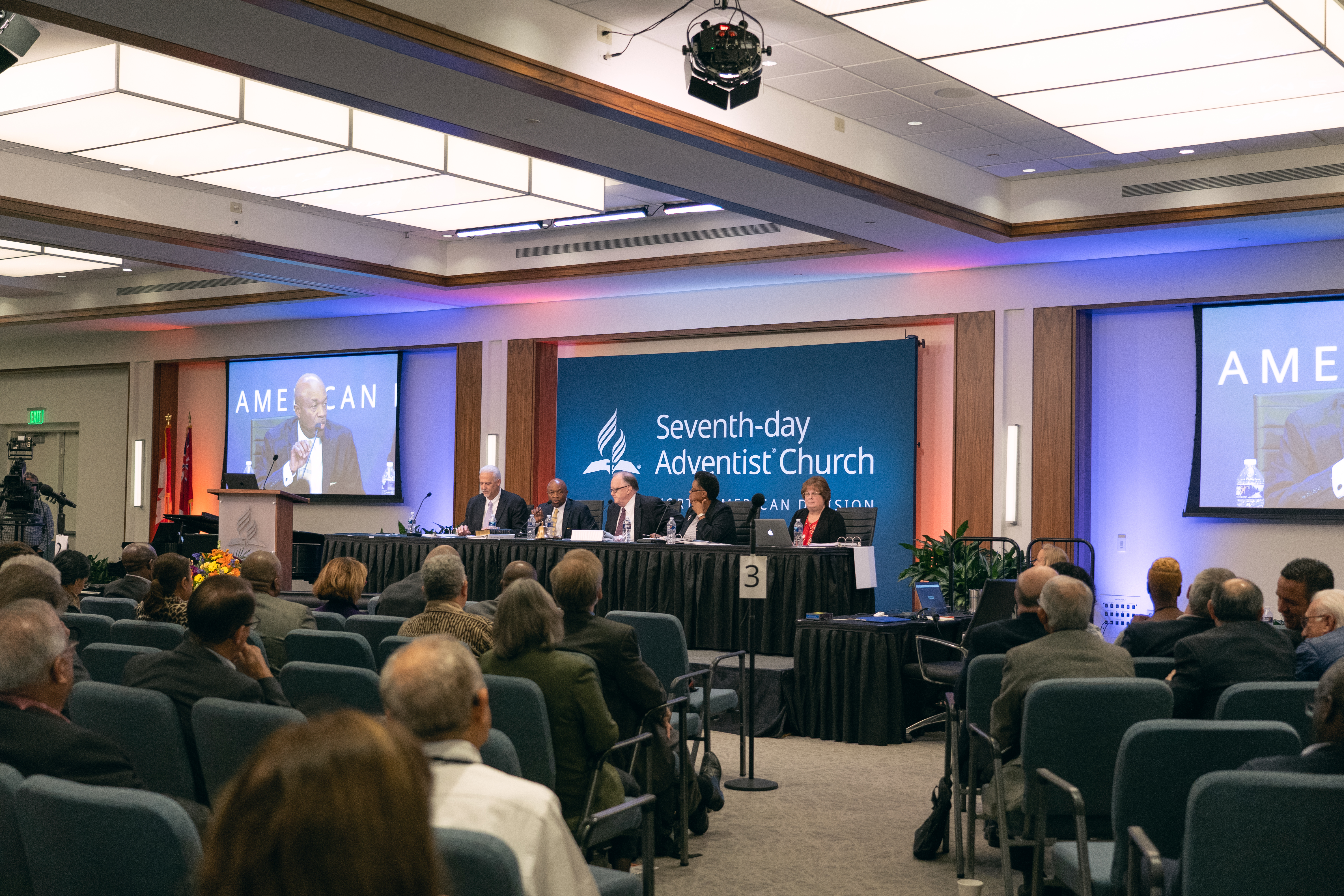 G. Alexander Bryant, executive secretary of the North American Division, addresses YEM delegates from the platform.