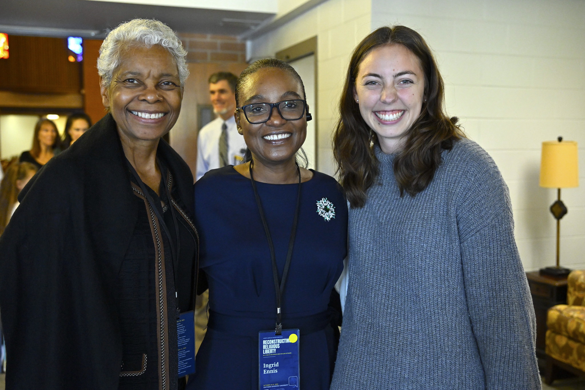 Reconstructing Religious Liberty Conference attendees smile brightly at the conference's Sabbath session on October 21, 2023