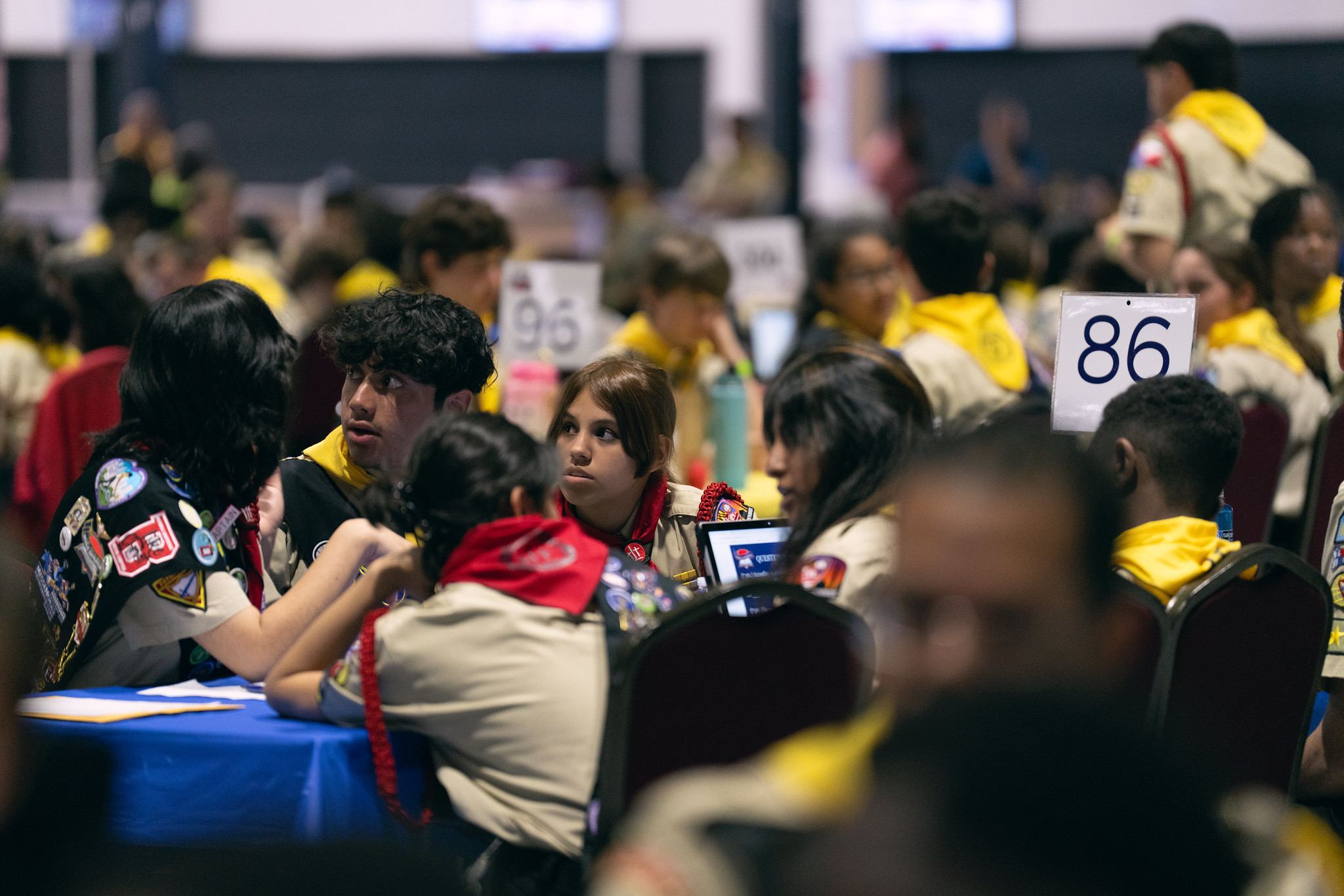 On the PBE 2023 testing floor, teams concentrate as they answer questions about the Book of John