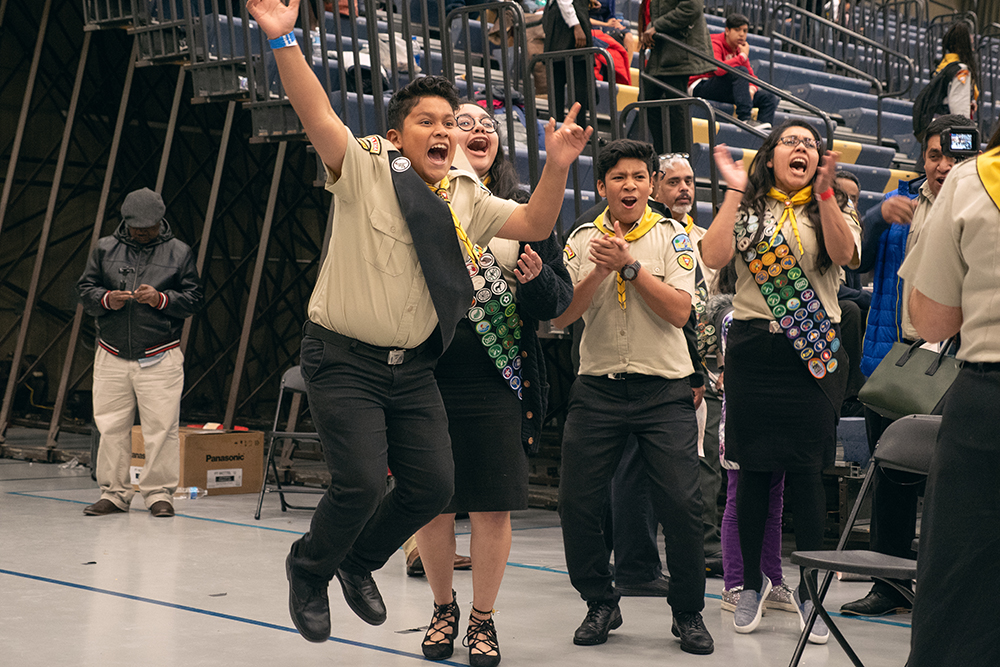 A team shouts after hearing their placement during the PBE awards ceremony.