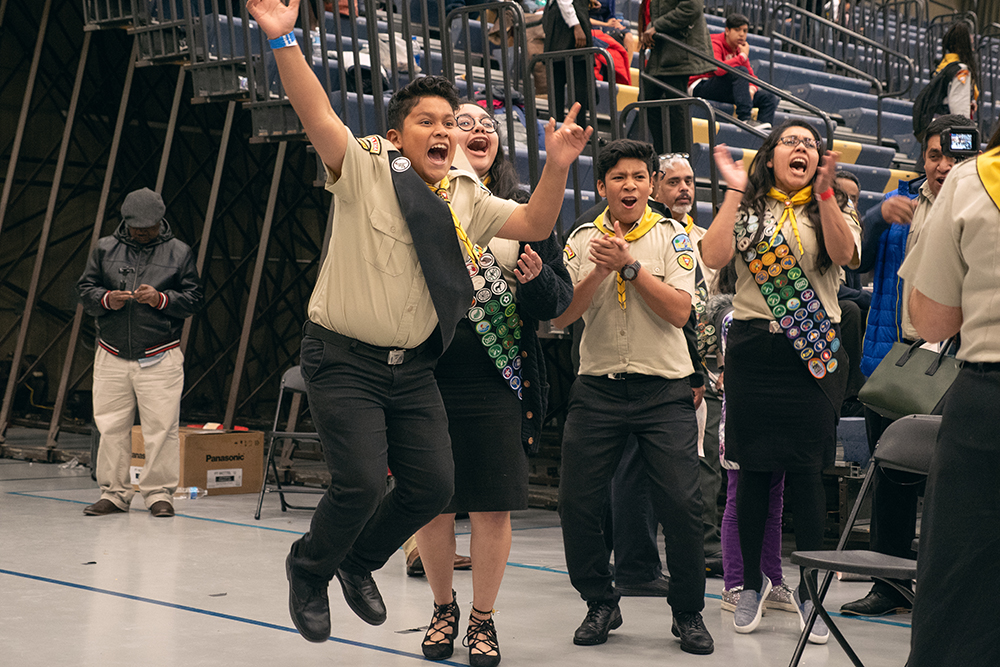 A team shouts after hearing their placement during the PBE awards ceremony. 