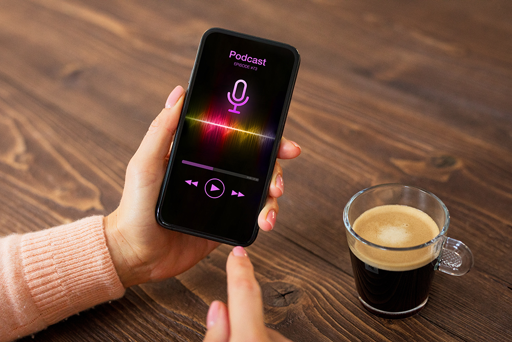 stock photo of phone and podcast on screen