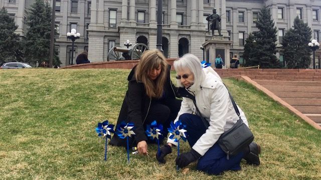 RMC employees with pinwheels