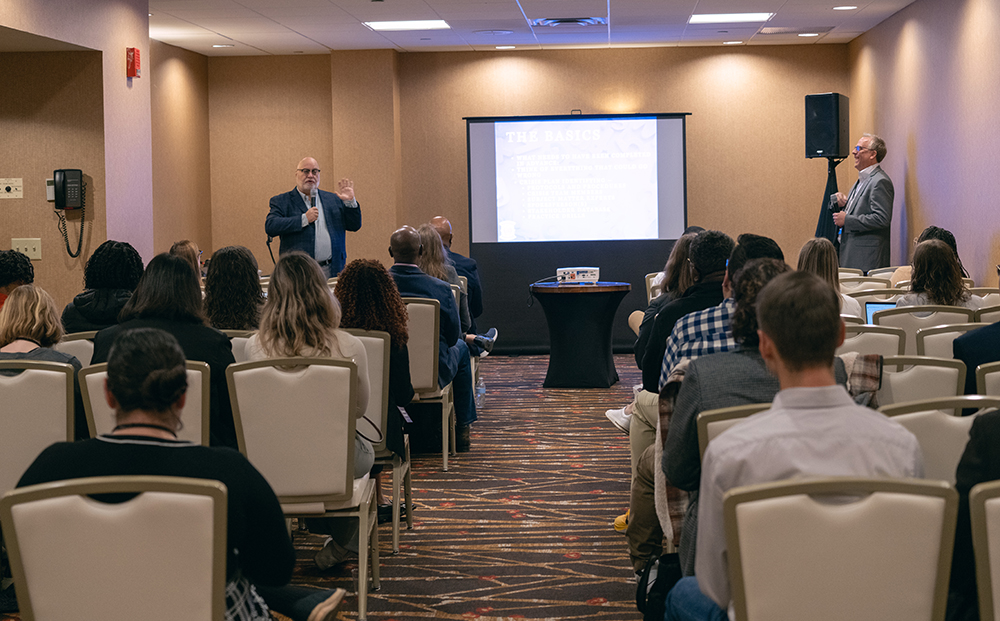 Kevin Lampe (left) and Greg Dunn talk about crisis communication during their Oct. 20, 2023, breakout workshop at the SAC convention in Springfield, Massachusetts.