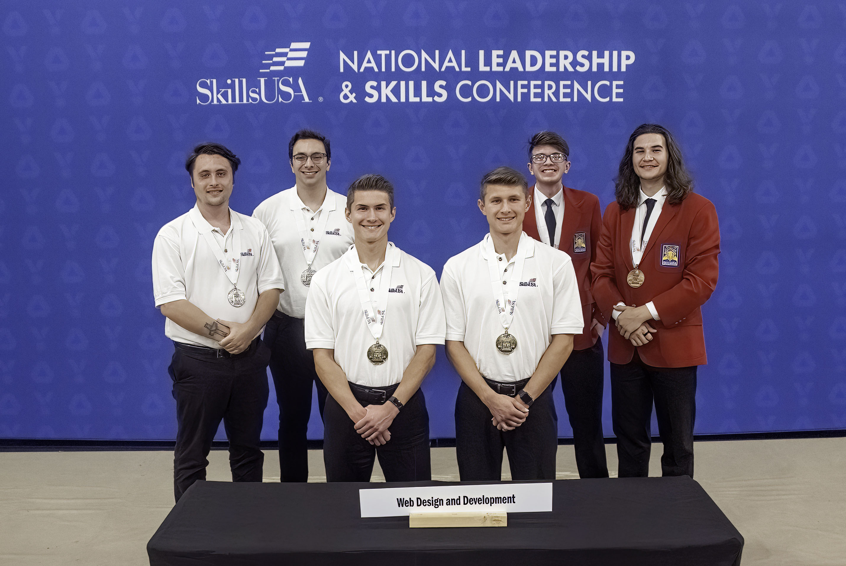 SkillsUSA 2022 national Web Design and Development medalists (Allen and Brandon Gustrowsky pictured at center)