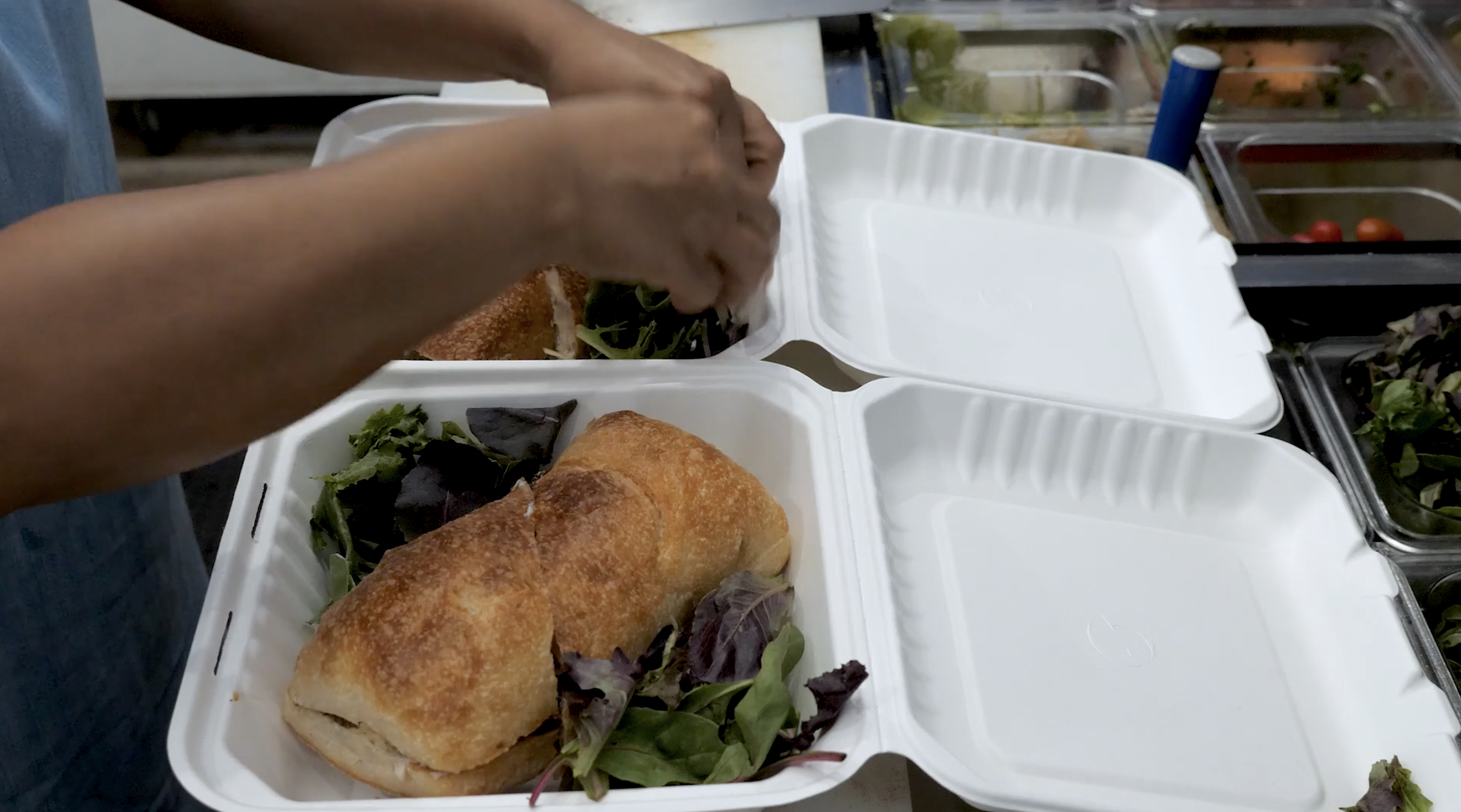 Two sandwich order are prepped at the Clinton cafe