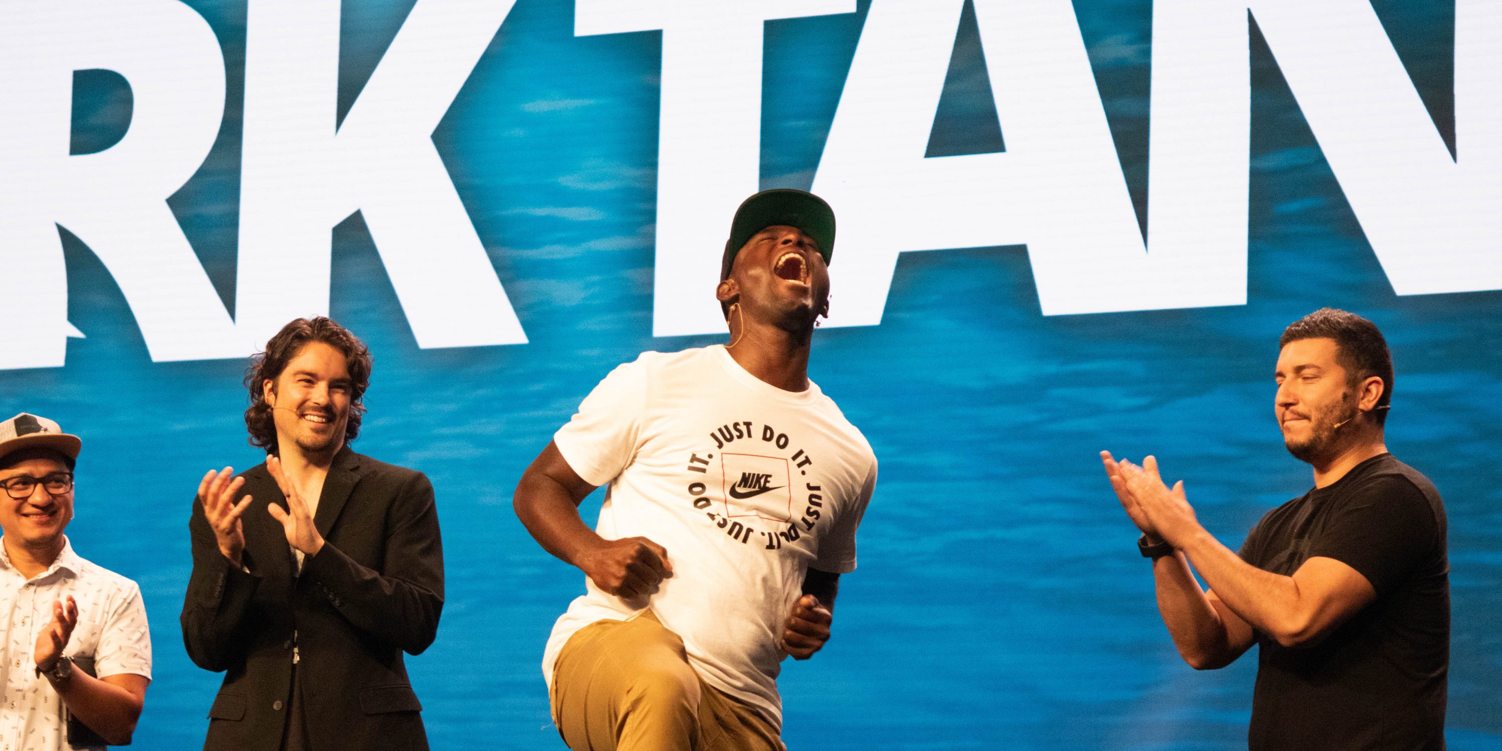 Taurus Montgomery celebrates after learning that his basketball ministry has just won $20,000 dollars. Photo by: Rayno Victor | Lake Union Herald