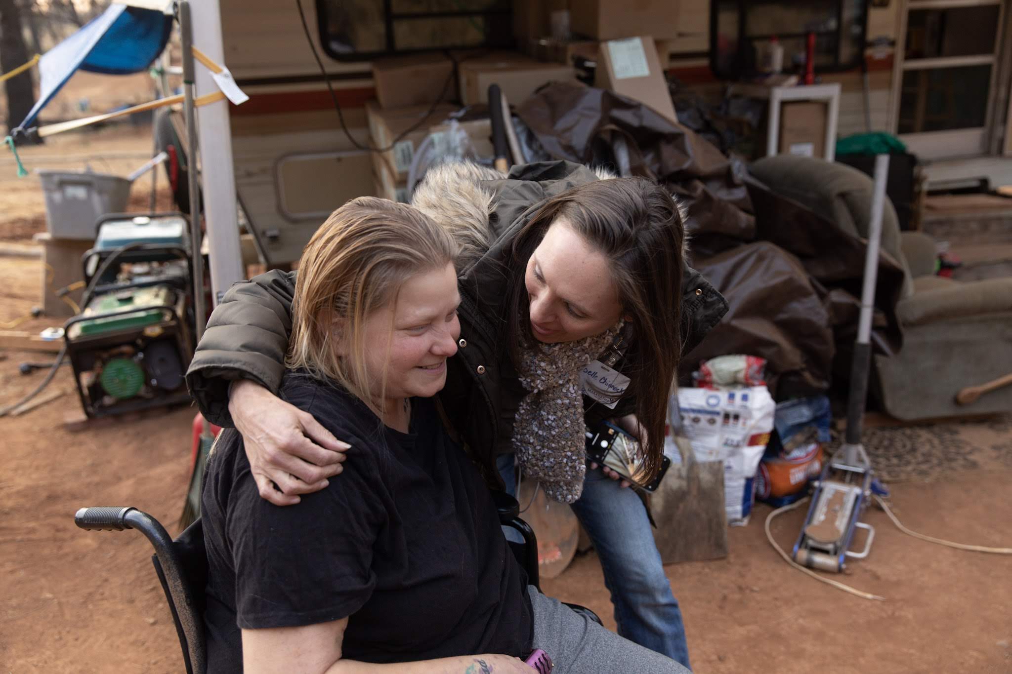 Ashley, who currently lives in a camper with her husband and two dogs, thanks Joelle Chinnock, build coordinator for the Love Paradise project, for a much needed storage shed.