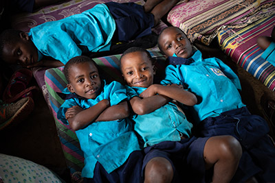 Classrooms have been converted into “dormitories” for the boarding students.  Space is so tight that the children must sleep three to a mat.