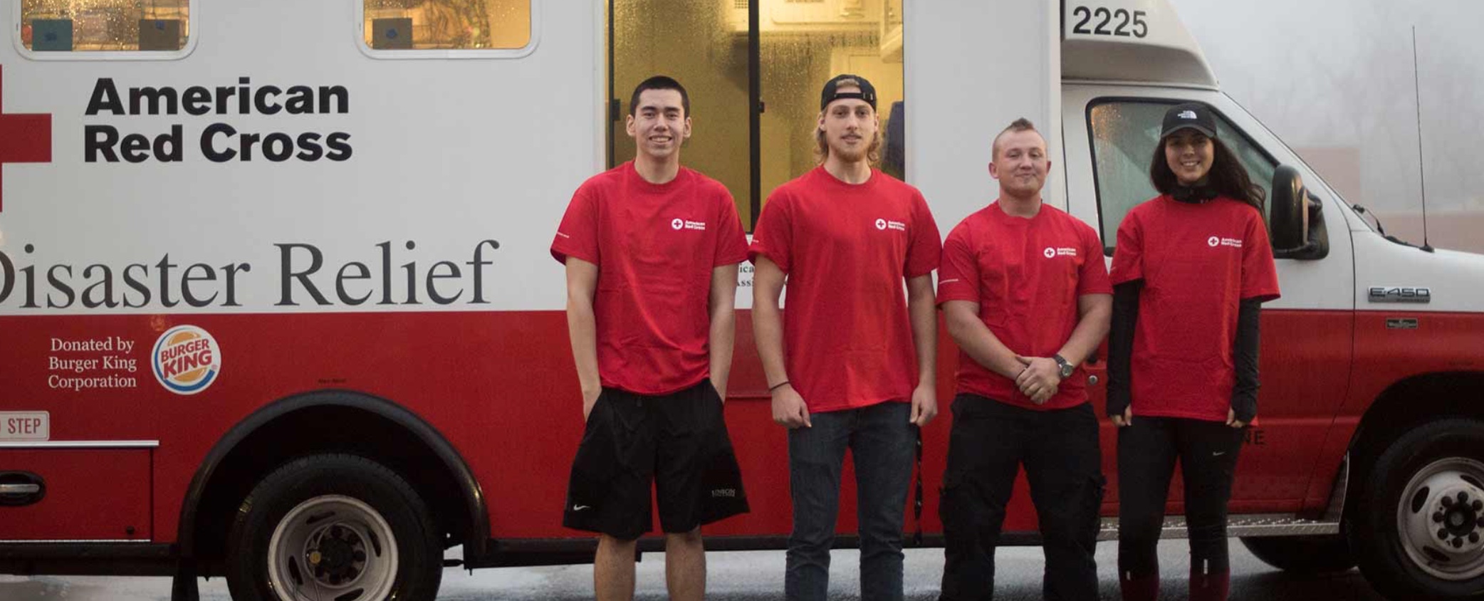 union college students in front of red cross truck