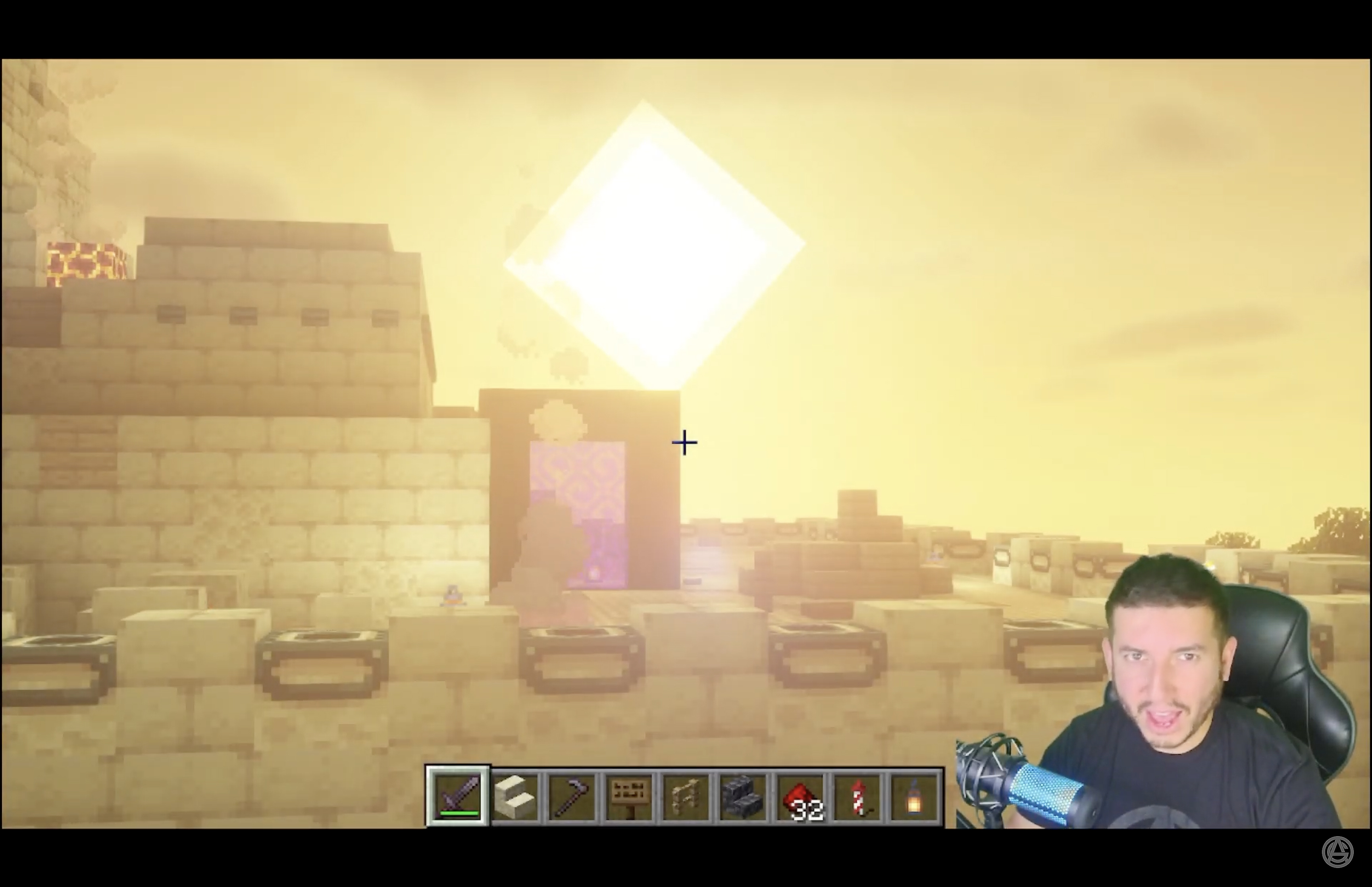 Screenshot of a man in front of a Minecraft build representing Babylon.
