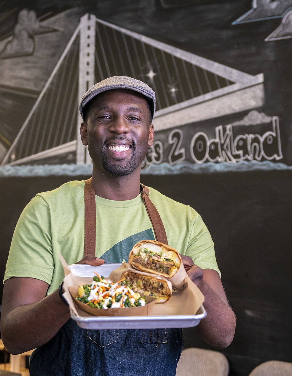 Chef GW Chew presents on of The Veg Hub's most popular sandwiches, a Philly cheez steak sandwich made with all vegan ingredients. Photo by Dan Weber