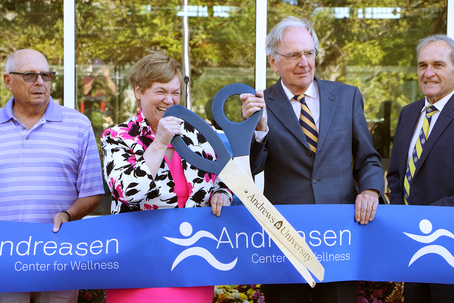 Andrews University officials prepare to cut the ribbon