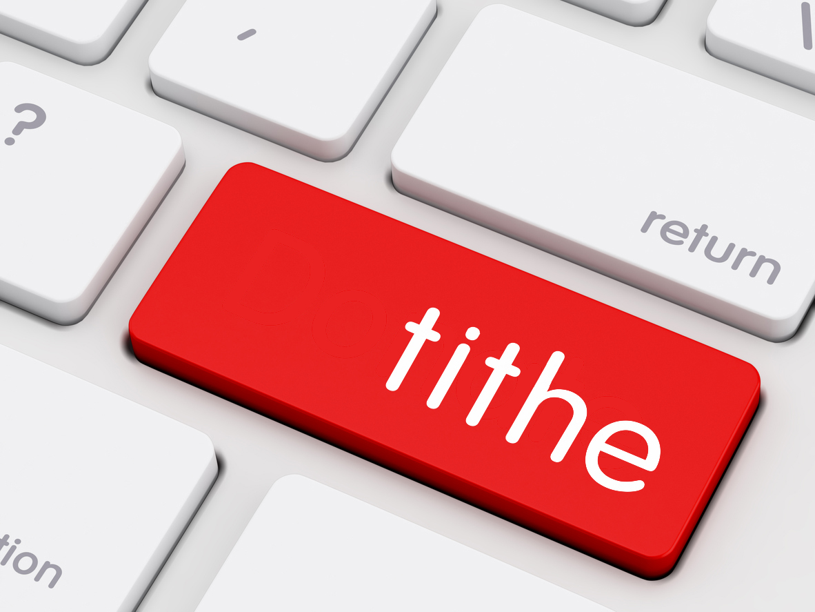 word tithe on computer keyboard