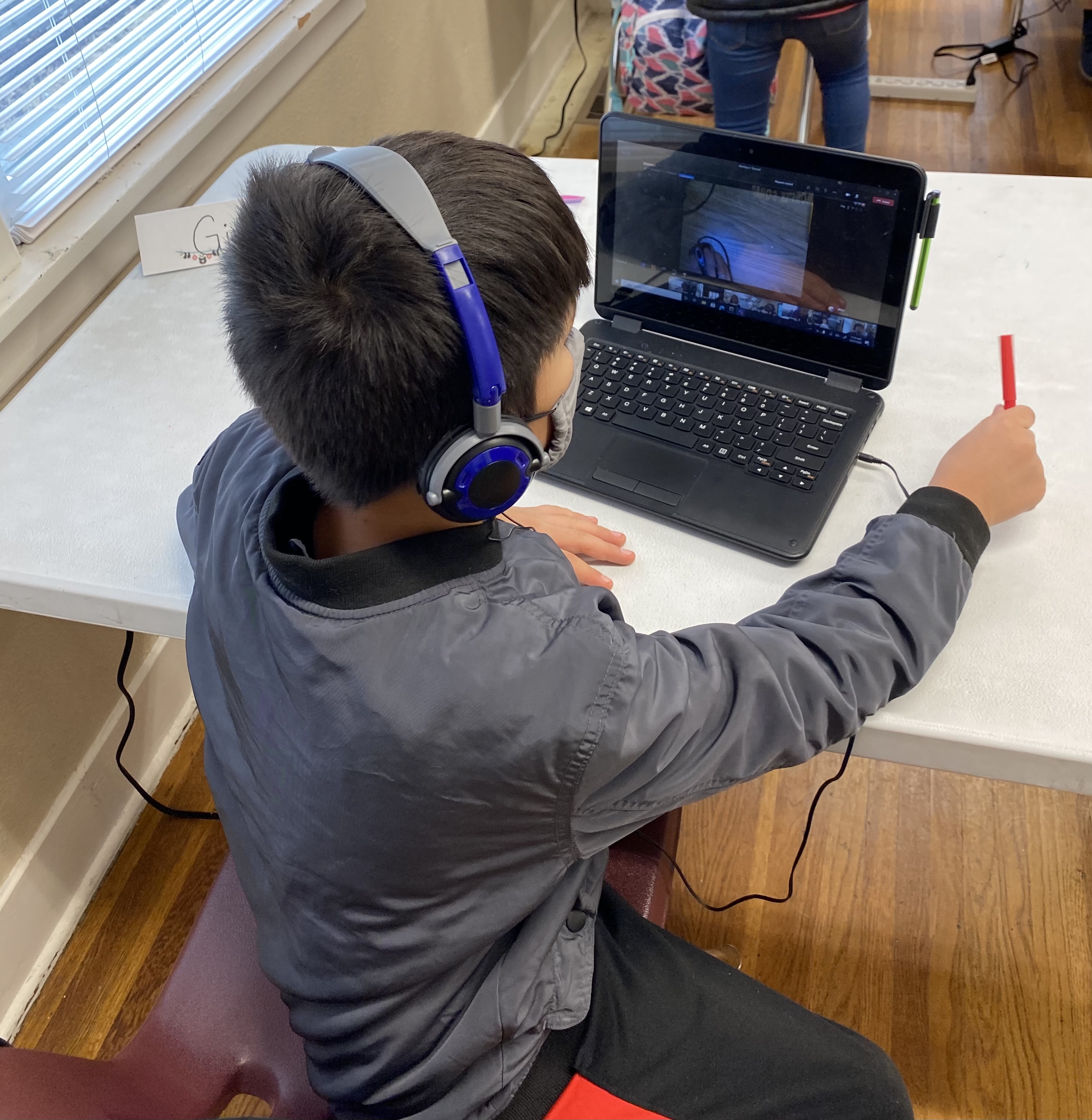 A student of Garfield Elementary School access wifi at Discovery Junction, which is an initiative of the Spokane Central Seventh-day Adventist Church. 