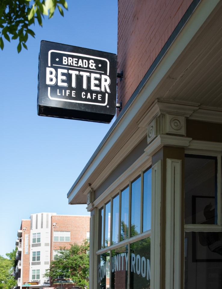 Outdoor sign of Bread and Better Life Cafe