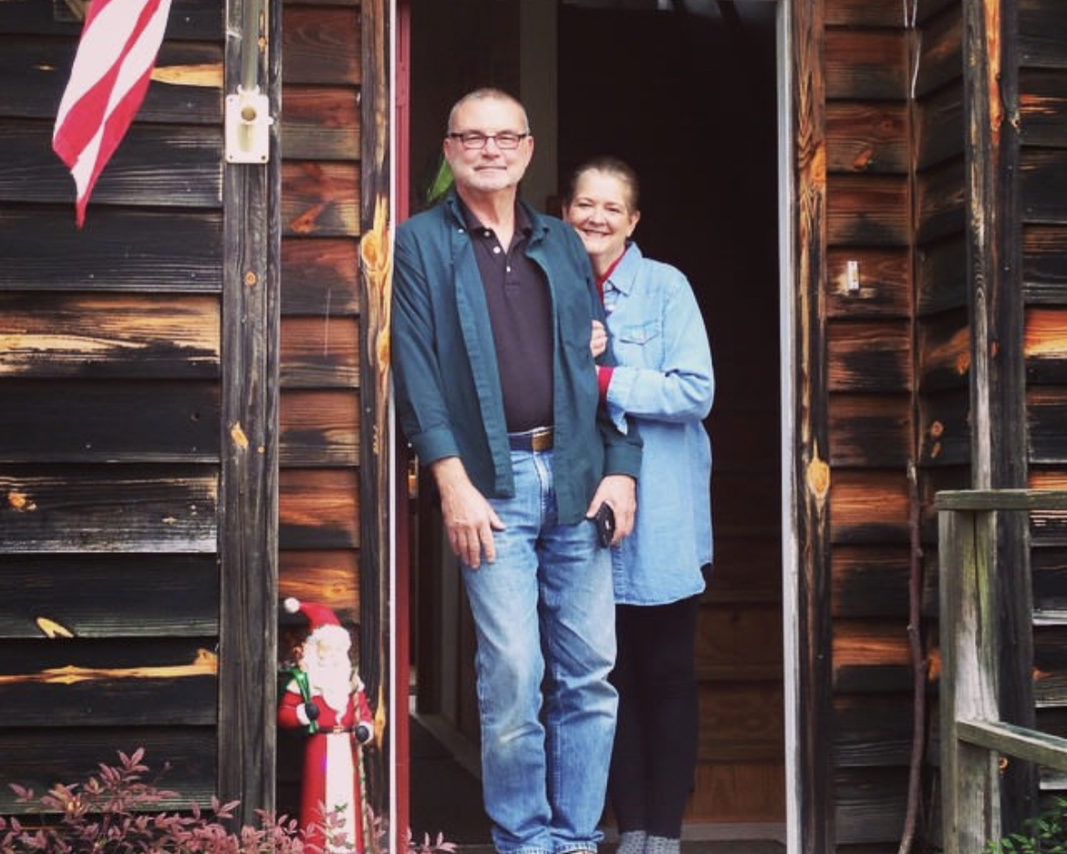 Debra and George Brill outside of their place in Virginia 