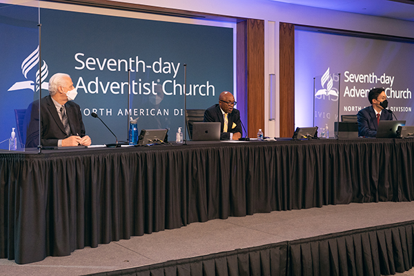 The North American Division's three officers greet executive committee members on Feb. 25, 2021.