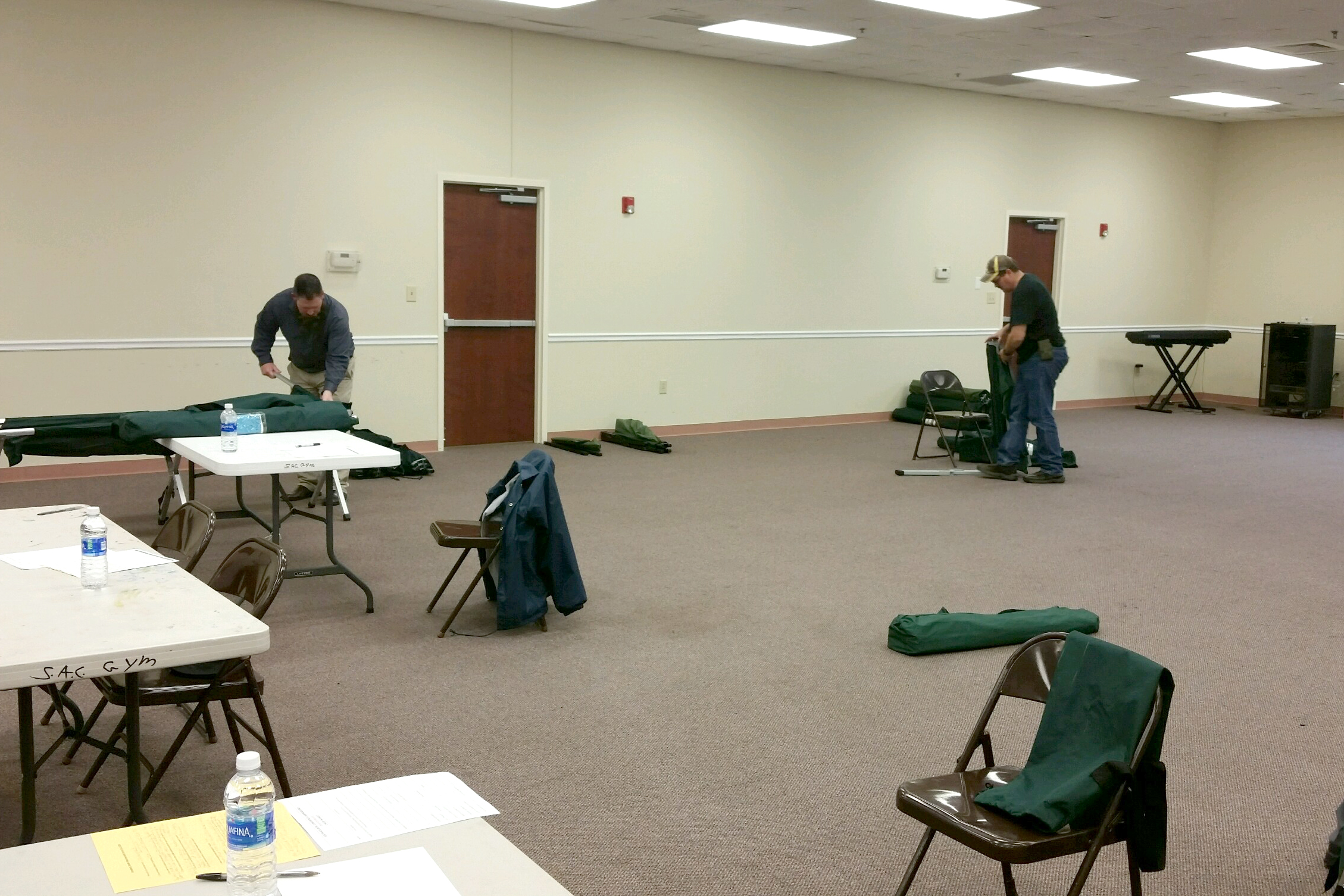 Cots are set up at the ACS Florence shelter