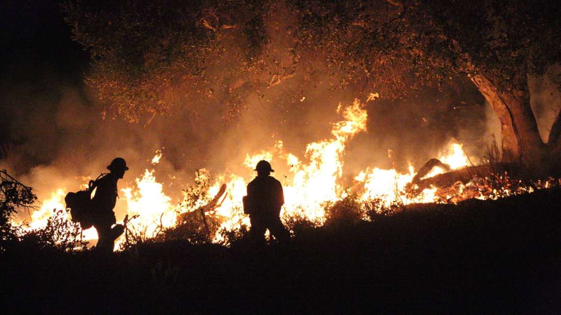 Paradise firefighters work as the Camp Fire burns through Paradise, California. Photo provided by Nancy Hamilton/Golden Eagle Films