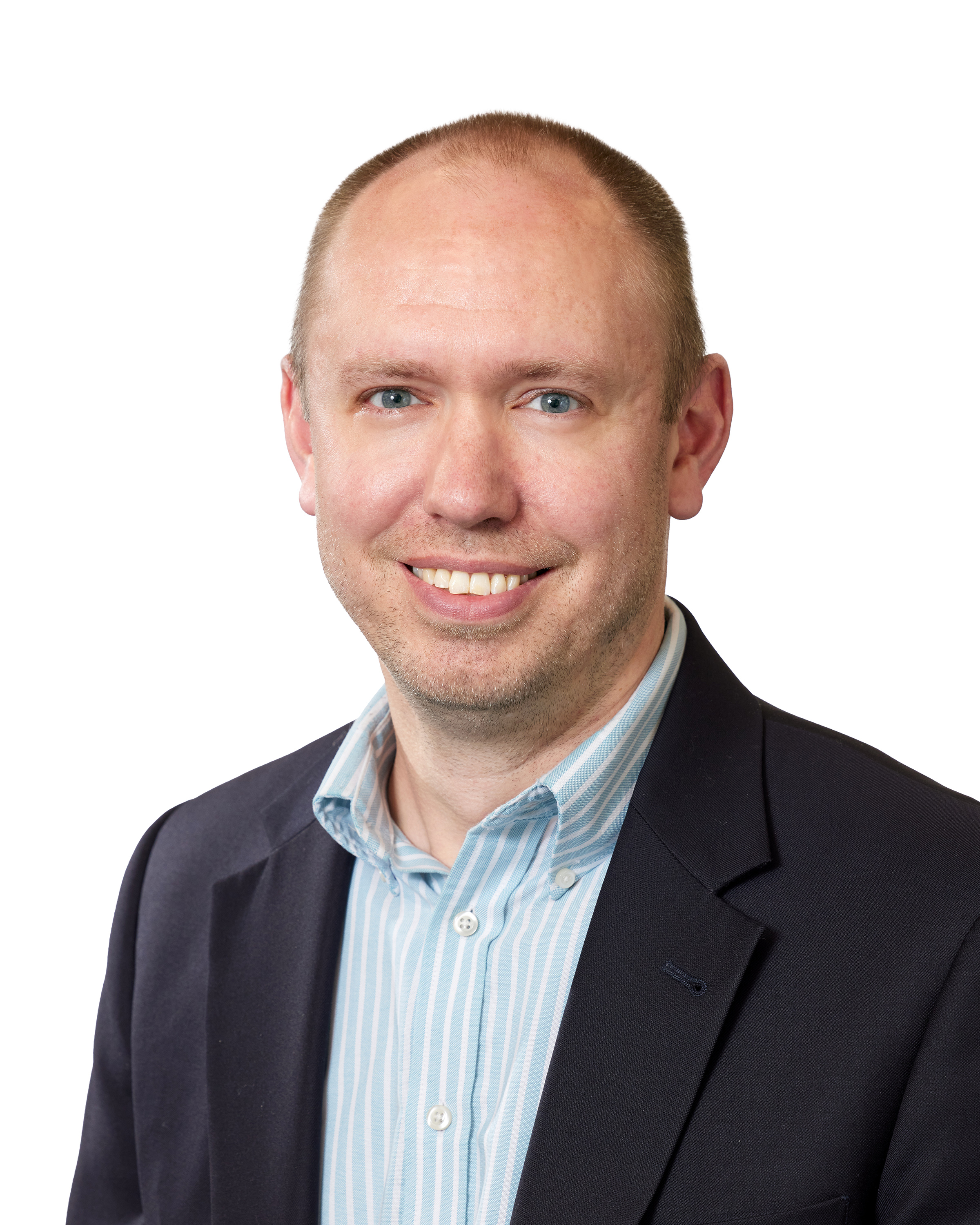Headshot of a smiling man
