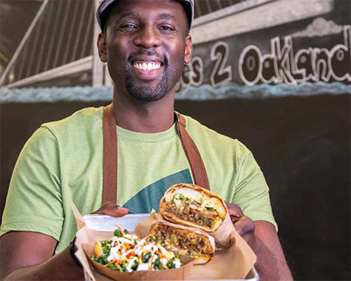 Chef GW Chew presents on of The Veg Hub's most popular sandwiches, a Philly cheez steak sandwich made with all vegan ingredients. Photo by Dan Weber