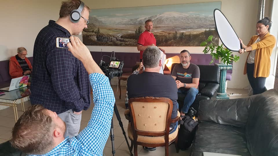 Photographers take a moment to record thoughts about their experience during the 2019 Iceland Photo Tour, a partnership with three Adventist world church divisions. Photo by Dan Weber 