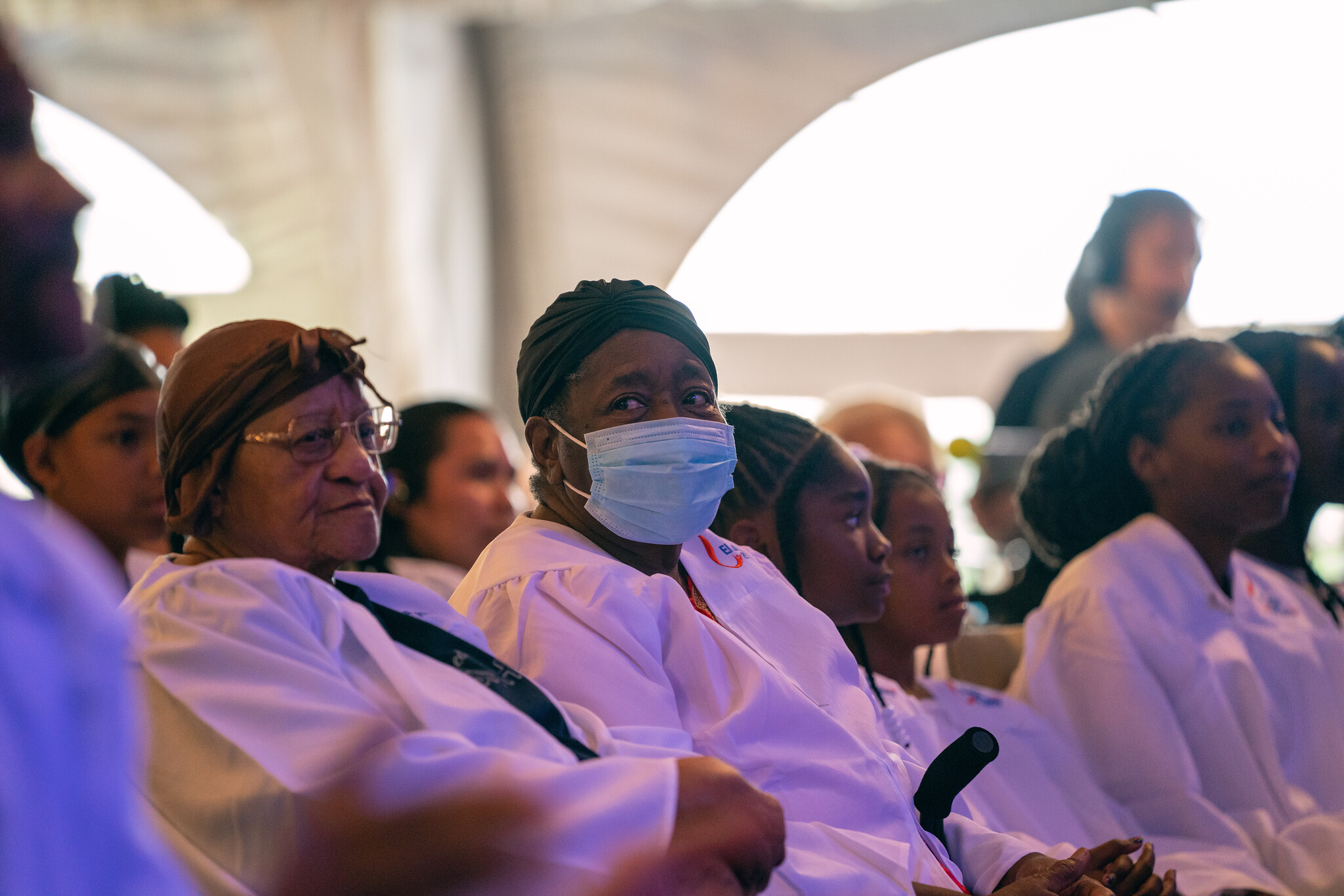 Baptismal candidates seated in the front row at Impact Columbus 