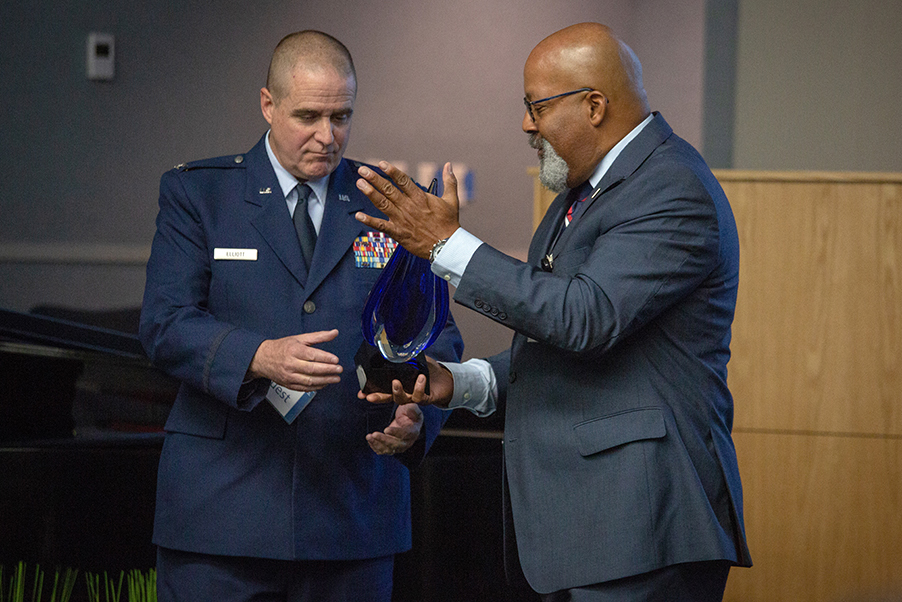 Air Force chaplain John Elliott receives recognition for the NAD for achieving the rank of colonel.