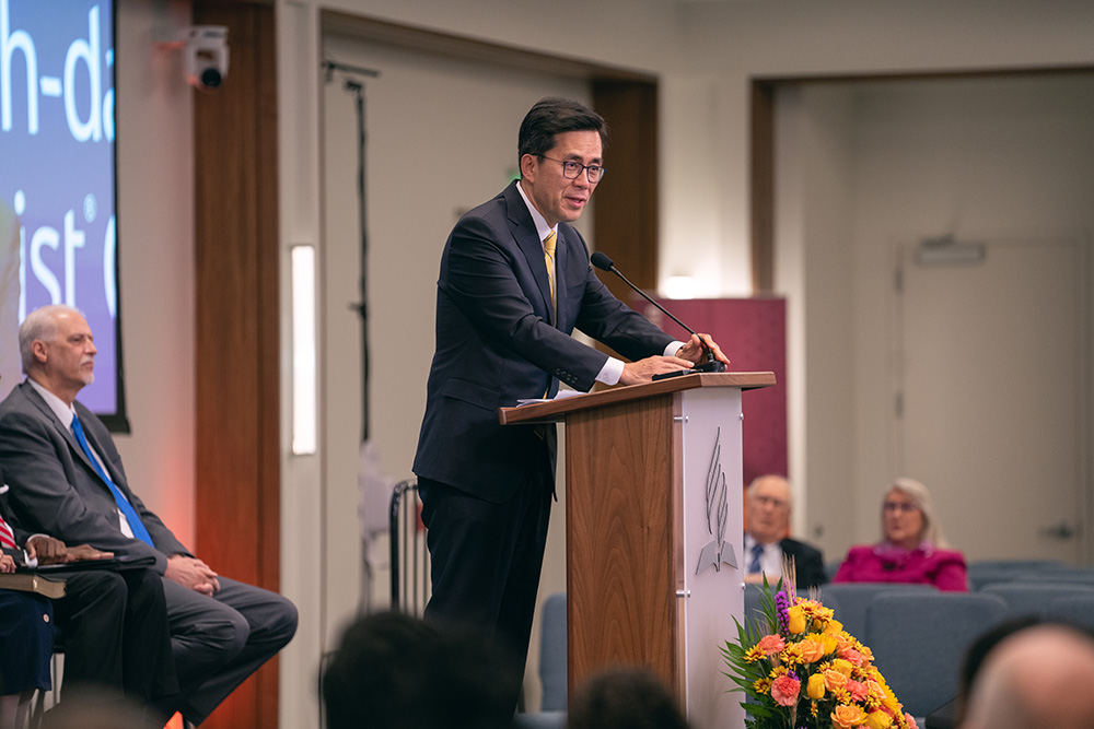 Before G. Alexander Bryant comes to the podium, NAD executive secretary Kyoshin Ahn, welcomes attendees and introduces Bryant on Oct. 29, 2022. Photo by Pieter Damsteegt/NAD