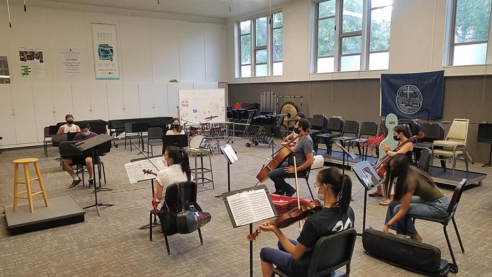 La Sierra students rehearse for recordings to be presented during the music department’s 73rd Annual Candlelight Concert to be presented virtually on Dec. 11 and 12, and its virtual gala on Dec. 20. (Photo: courtesy of Dean Anderson)