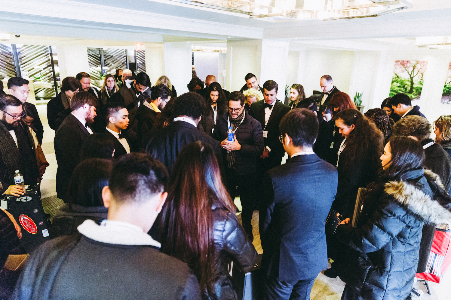 WE.LSU.CARNEGIE.prayer – The La Sierra University Wind Ensemble, led by associate music department chair and professor Elvin Rodriguez prays back stage before the ensemble’s performance at Carnegie Hall.