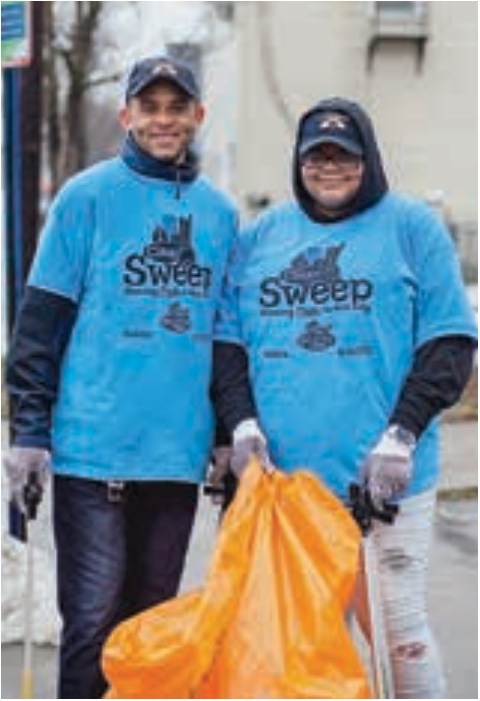 volunteers cleaning streets