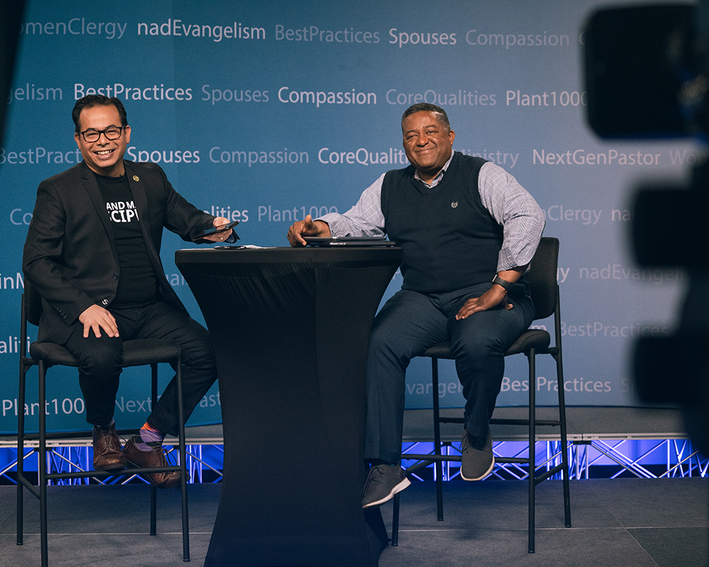 Jose Cortes Jr and Ivan Williams talk to attendees on the first day of eHuddle 2022