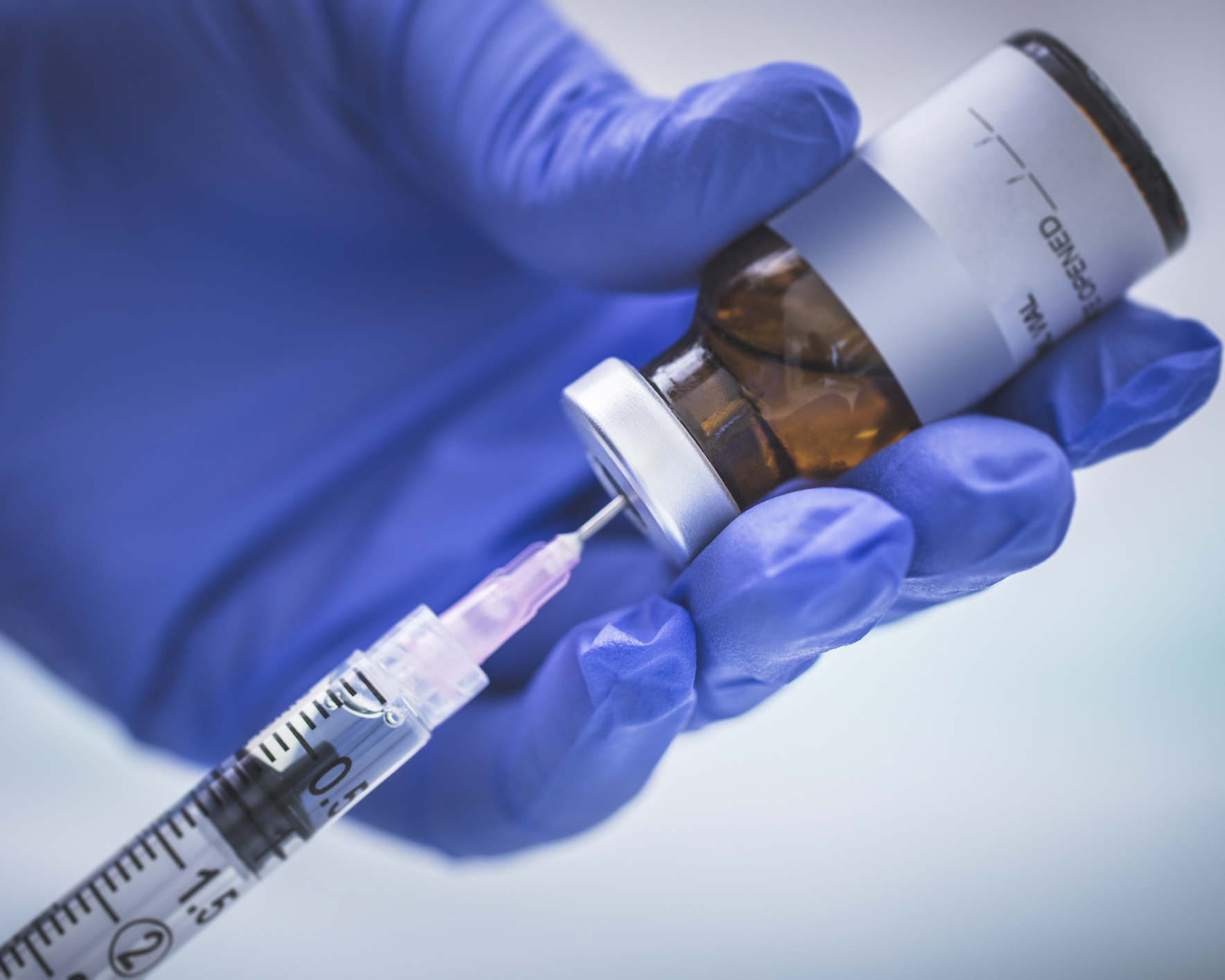 stock photo of needle and vaccine