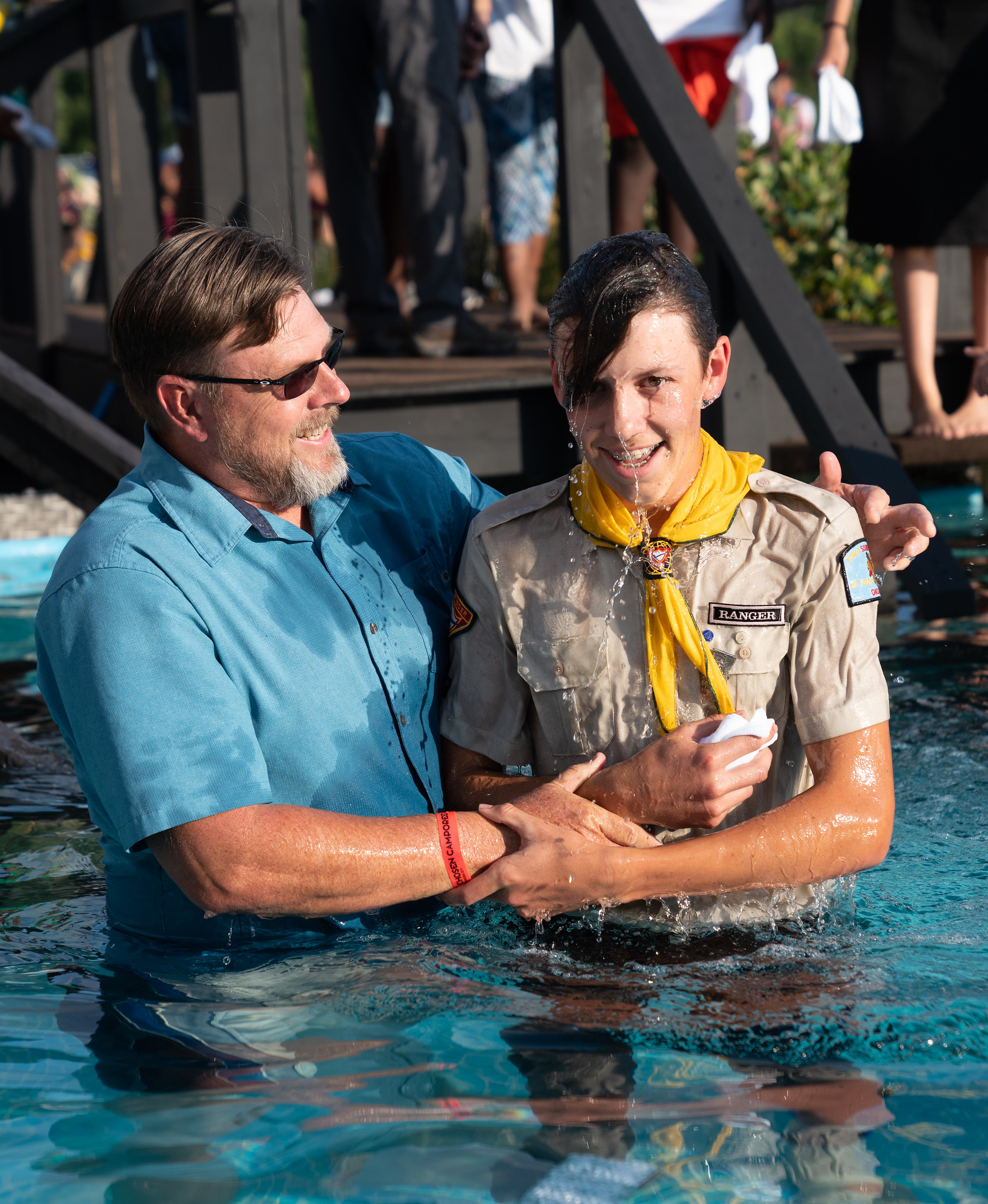 oshkosh 2019 James Bokovoy, pastor of the Okmulgee Seventh-day Adventist Church in Oklahoma, baptizes a teen Pathfinder Terrence Bowen photo 