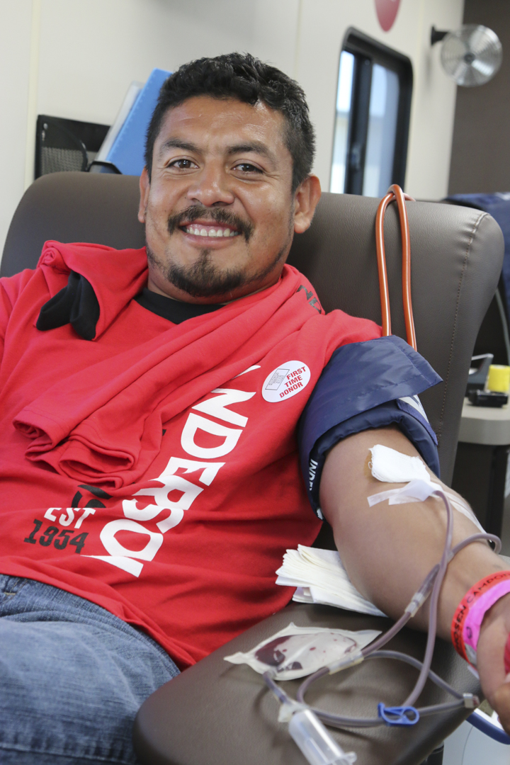 Pathfinders, club leaders, and other attendees donate at an onsite blood drive near the EAA hangers at the 2019 Chosen International Camporee in Wisconsin. 