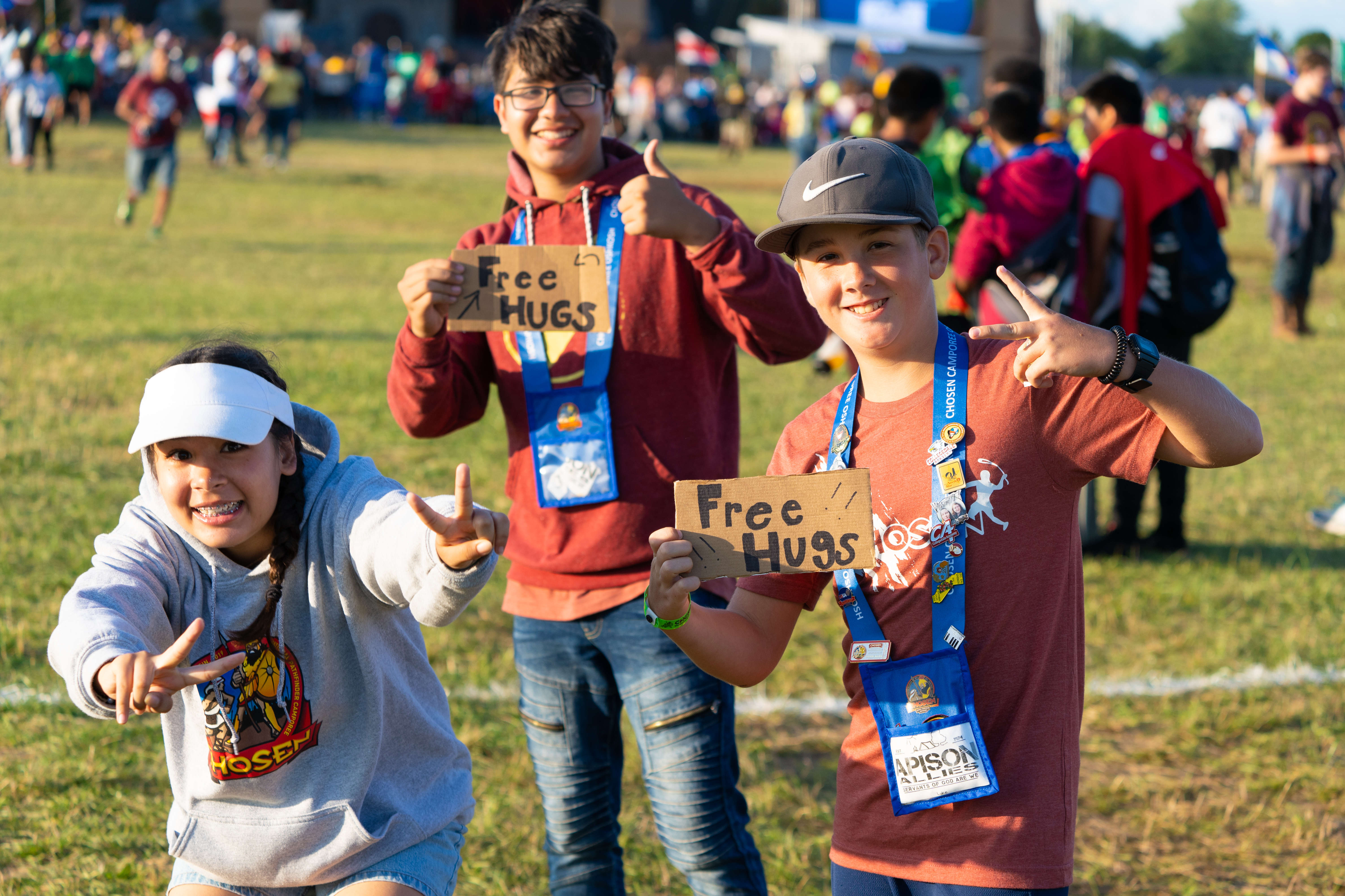 While not an official Compassion Project at the camporee, these Pathfinders show compassion by offering free hugs near the main stage. Photo by Terrence Bowen