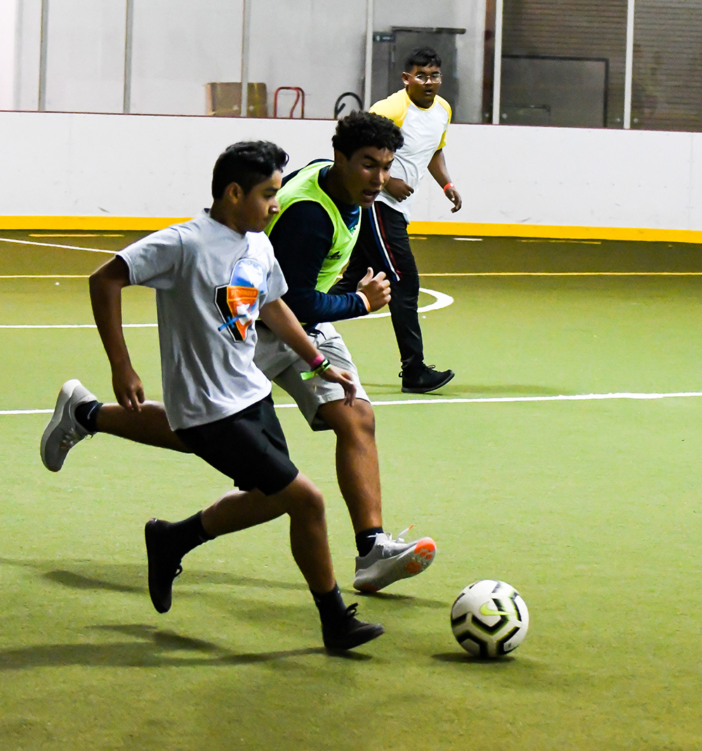 At the 2019 Pathfinder camporee in Oshkosh, Wisconsin, clubs participated in a few tournaments, including golf, basketball and soccer. Here, two teams play in a soccer game in the tournament. Photo by Sonja Hults 