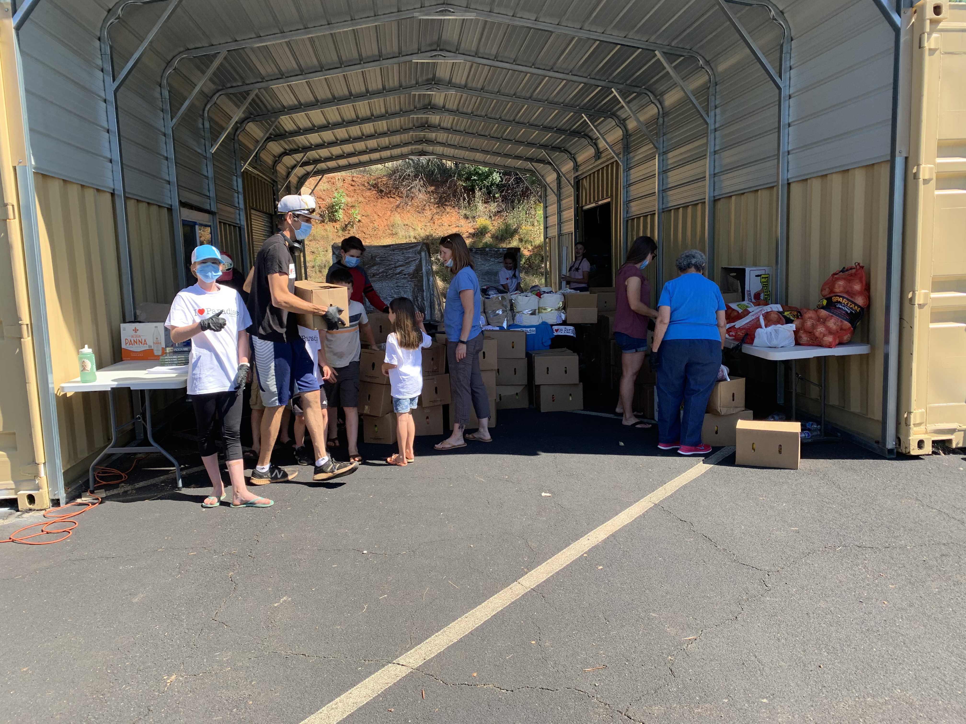 On Tuesdays, families work together filling and delivering boxes of food. Grateful to get out of the house and a safe outreach, they serve others during shelter in place. 