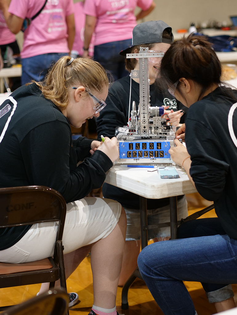 Adventist robotics girls working