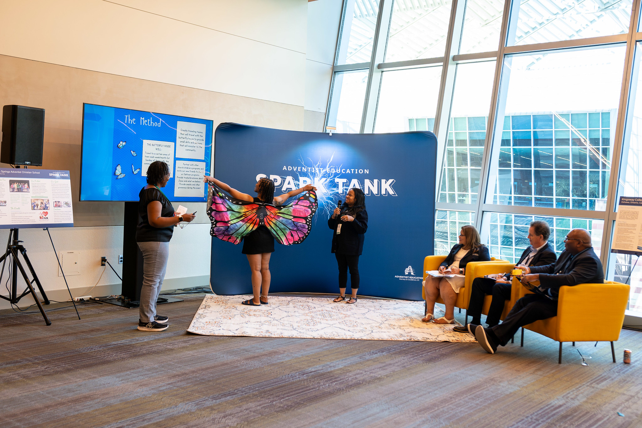 Oakwood Adventist Academy butterfly presentation at educators' convention spark tank event