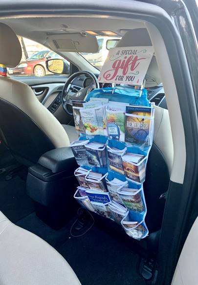 Uber Outreach tract rack for car