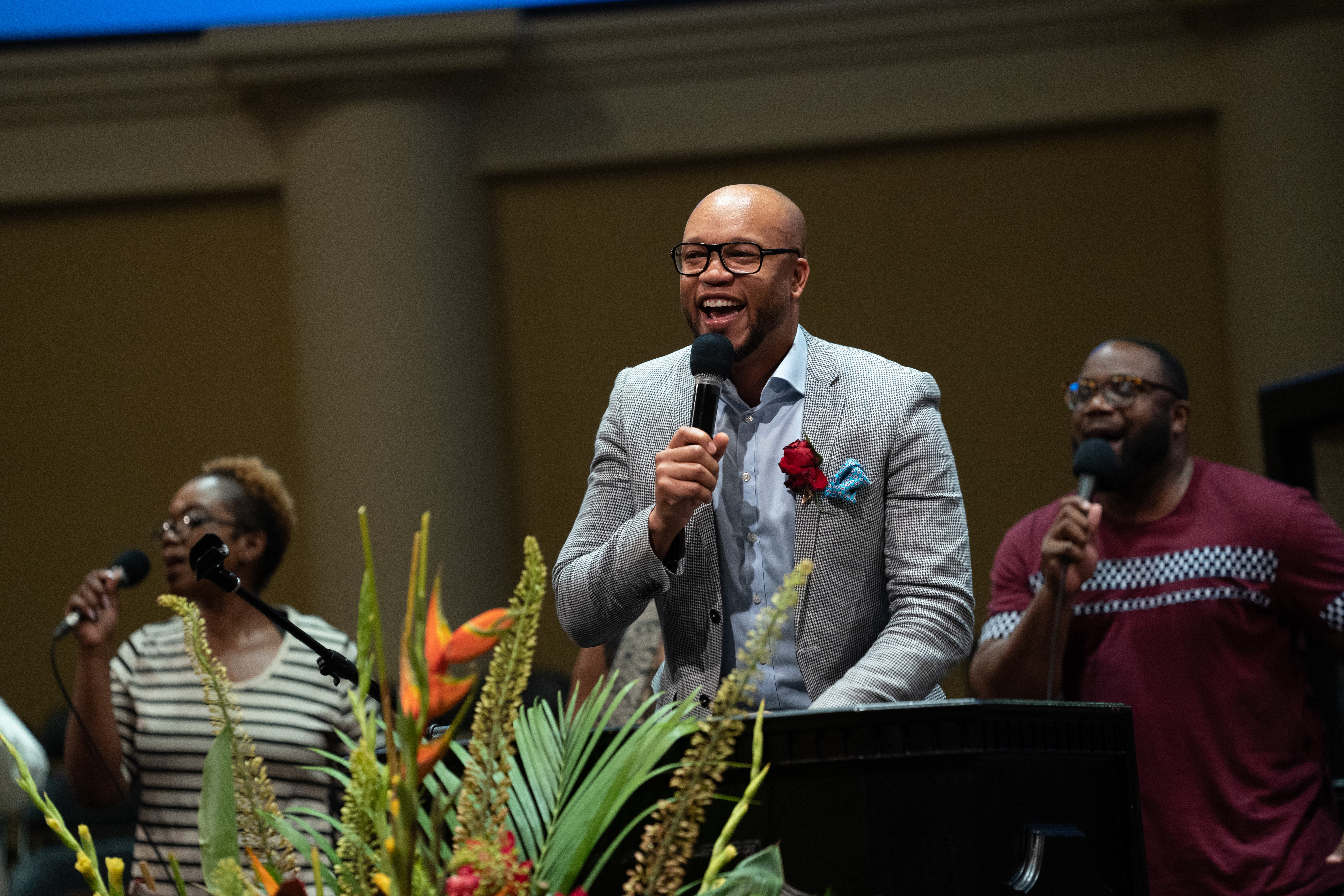 Pastor Damian Chandler of the Capitol City church leads out in praise and worship at Urban Camp Meeting. 